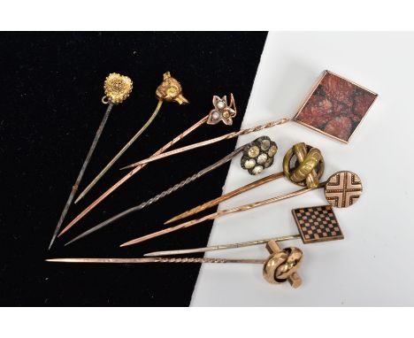 NINE STICKPINS, to include a colourless paste cluster, a square checkerboard, a cannetile heart, together with a diamond shap