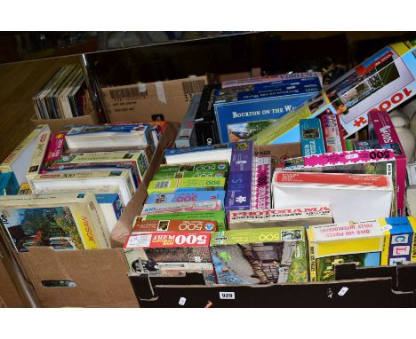 THREE BOXES OF BOXED JIGSAW PUZZLES including a boxed jigsaw roll, Arrow puzzles, Falcon puzzles, Waddingtons, Gibsons etc, s