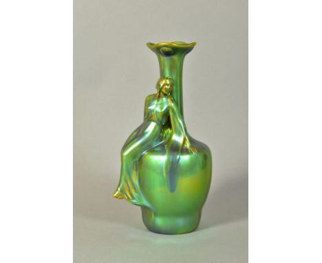 A ZSOLNAY GREEN LUSTRE FIGURAL VASE, shaped as maiden reclining on vase, black backstamp, height 24.5cm