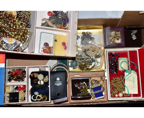 A BOX OF COSTUME JEWELLERY, to include earrings, necklaces, brooches, Rotary badges etc and a selection of silver and white m