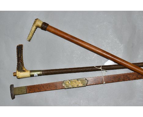 A DRING AND FAGE LTD COOPERS MEASURING STICK, with two horn handled riding crops (3)