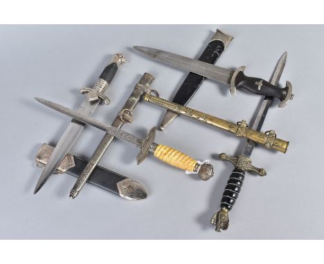 FOUR GERMAN 3RD REICH WWII DAGGERS, all complete with scabbards, (a Kriegsmarine dagger, Eagle/Swastika pommel, black grip, b