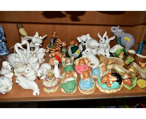 A GROUP OF ORNAMENTS, to include Coalport swans 'Together Forever', seal, cat, dog, frog etc, Royal Doulton Doves 'Always and