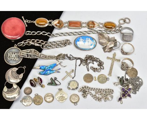 A SELECTION OF SILVER AND WHITE METAL JEWELLERY, to include an enamel swallow brooch, a gem panel bracelet, an oval butterfly