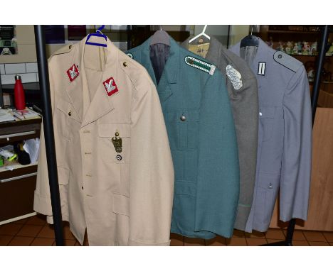FOUR UNIFORM JACKETS IN THE STYLE OF 3RD REICH GERMAN, one Political leaders jacket with metal insignia (copies) and trousers