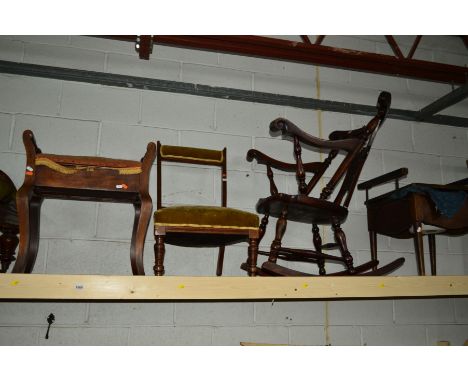 AN EARLY 20TH CENTURY MAHOGANY ROCKING CHAIR with a carved grotesque face splat back, together with an Edwardian piano stool,