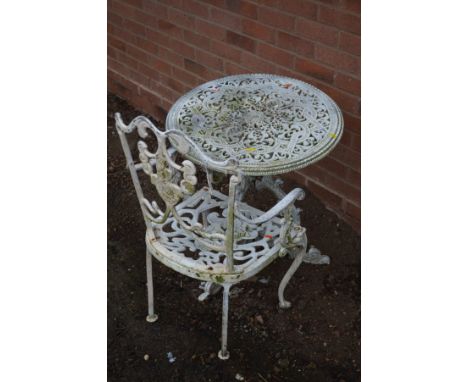 A WHITE PAINTED ALUMINIUM CIRCULAR GARDEN TABLE and a matching chair (2)