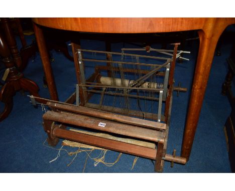 A VINTAGE HARRIS LOOM, (in need of restoration), along with a set of twenty two ladder back chairs (four on show, eighteen in