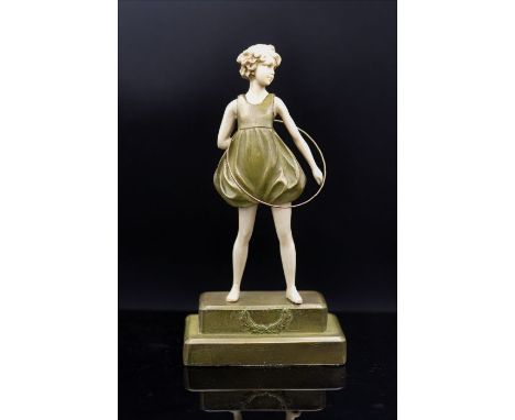 Art Deco sculpture, depicting a young girl playing hula-hoop on a plinth, 22cm high