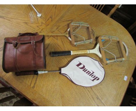 Lawn bowls in leather case and 3 vintage rackets with frame press protectors 
