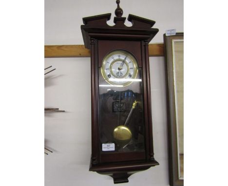 Timemaster wall clock with pendulum and key
