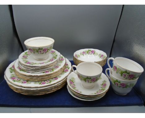 Colclough (roses) part dinner/tea service to incl 18 plates of varying sizes, 6 bowls, 3 cups and 4 saucers