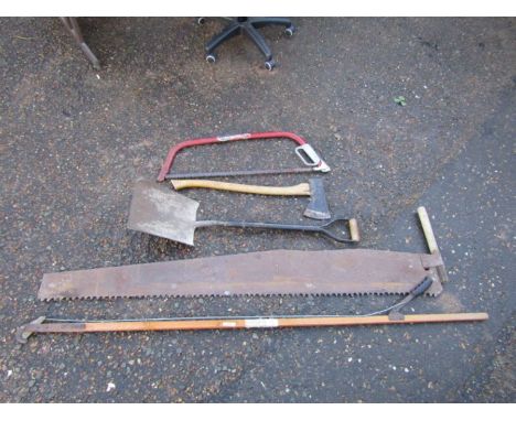 Garden tools including axe and saws etc 