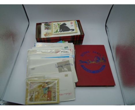 Collection of over 150 First Day Covers plus a small schoolboy stamp album