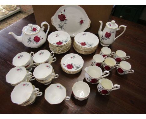 Royal Albert  'sweet romance' part tea set comprising 1 cake plate, 12 side plates, i teapot, 1 coffee pot, 11 tea cups, 12 t