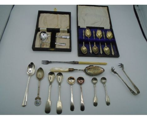 A silver plated pusher set for feeding a baby in original box, six plated tea spoons in original box, plus various silver pla