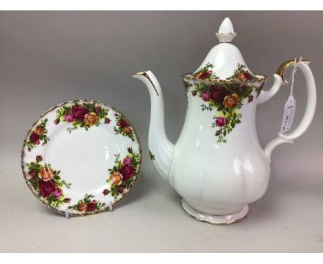 ROYAL ALBERT COUNTRY ROSES PART TEA SERVICE, comprising tea pot, cups, saucers, salt, pepper, cloth, jug and bowlGood overall