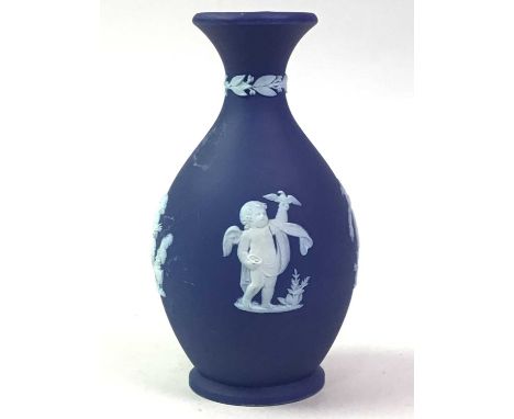 GROUP OF WEDGWOOD JASPERWARE, including a mantel clock and a pair of vases