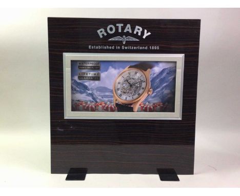ROTARY WATCH DISPLAY, with countersunk spaces to display wrist watches, along with a collection of other watch stands