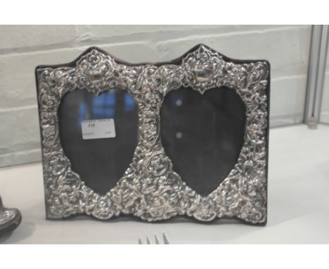 A pair of double portrait HM silver photograph frames
