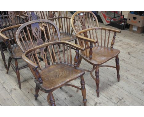 A pair of 19th century  elm stick back windsor chairs with cow horn stetchers