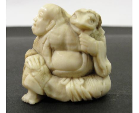 A Japanese Ivory Netsuke:
Meiji period
In the shape of Gama Sennin with a frog on his shoulder
H 4 cm
