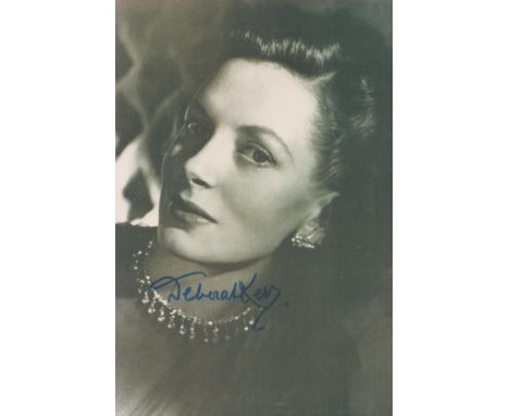Actress Deborah Kerr signed 6 x 4 inch b/w vintage portrait photo. Good condition. All autographs come with a Certificate of 