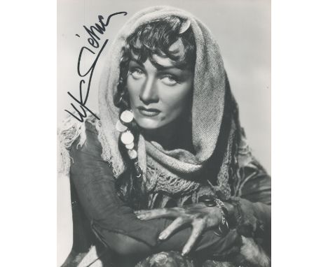 Marlene Dietrich signed 10 x 8 inch b/w portrait photo, gypsy costume pose. Good condition. All autographs come with a Certif