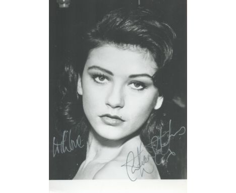 Catherine Zeta Jones signed stunning 7 x 5 inch b/w head and shoulders portrait photo, inscribed with love. Good condition. A