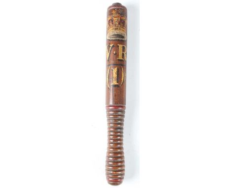 A Victorian turned wooden police truncheon, gilt and painted with 'V.R (1)' cypher, length 34cm.