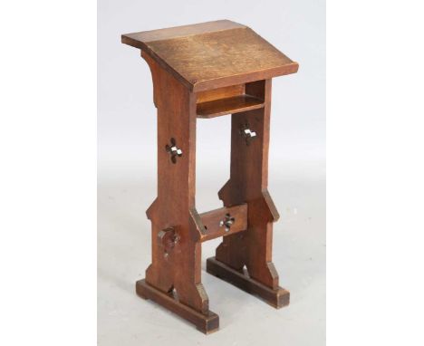 A late Victorian oak ecclesiastical lectern with reading stand and bible shelf, height 73cm, width 35cm, depth 30cm.
