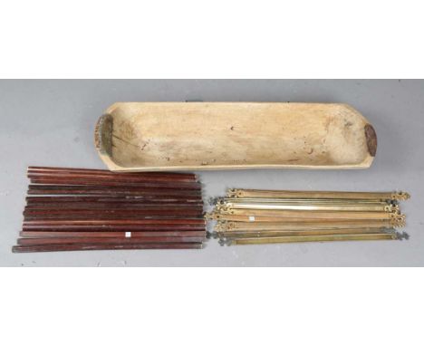 A set of fifteen mahogany and brass mounted Cracknell's Patent stair rods, width 64cm, another set of brass stair rods, width