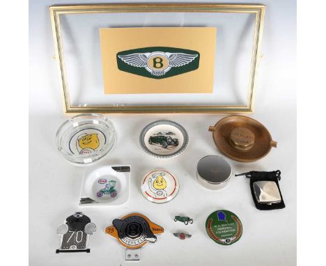 A mixed group of automobilia, including a cast metal Bentley London ashtray, width 17.5cm, a Bentley glass advertising panel,