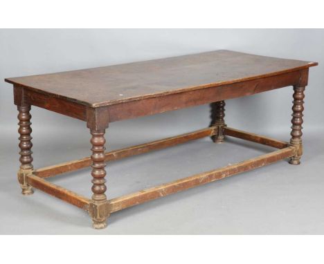 An 18th century and later elm and oak refectory table, on bobbin turned and block legs, height 75cm, length 199cm, depth 91cm