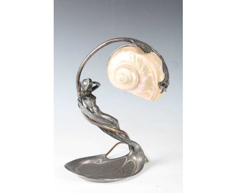 An Art Nouveau electroplated pewter figural table lamp, designed by Moritz Hacker, with seashell shade, model No. 113, cast i
