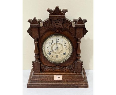 An American oak cased mantle clock. 15' high