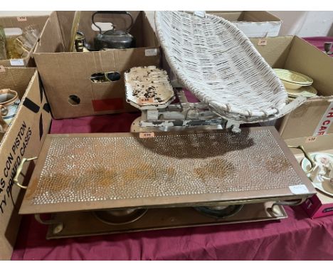 A copper plate warmer and a set of infant scales