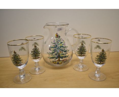 A Spode glass carafe set, of festive interest with Christmas tree decoration to each piece, the jug measures 24cm high and th