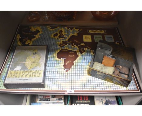A vintage Shipping an Ahoy Series Game with world map board and boxed set of instructions, player pieces and in game currency