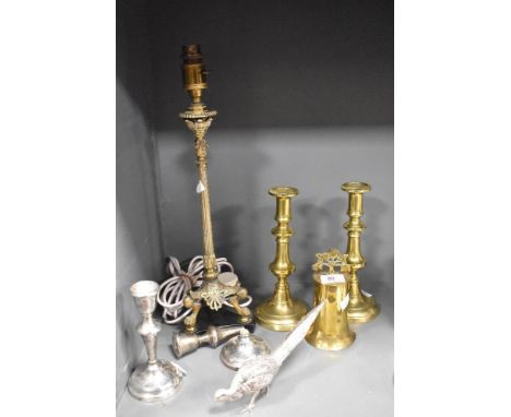 A French gilt metal table lamp base, raised on an ebonised triform base and measuring 48cm high, and a selection of other met