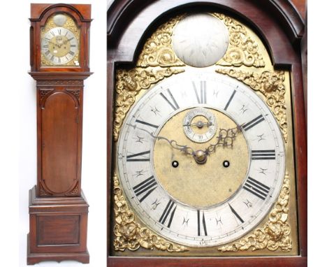 A 19th century mahogany longcase clock, the arched brass dial set with silvered chapter ring and subsidiary seconds dial and 