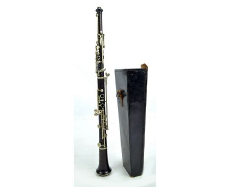A Hawkes & Son of London 'Superior Class' rosewood clarinet, in leather case.