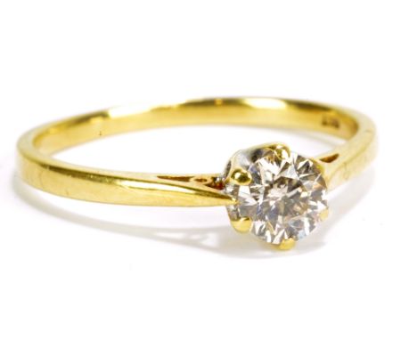 An 18ct yellow gold and diamond solitaire ring, the round brilliant cut stone approx 0.33cts, size P, approx 2.6g.