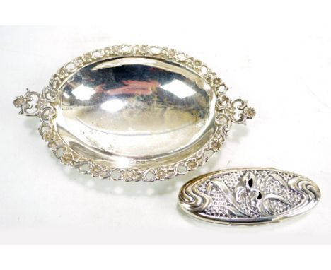 An Edward VII hallmarked silver twin handled oval dish with foliate scroll rim, maker's mark rubbed, London 1901, length 15.5