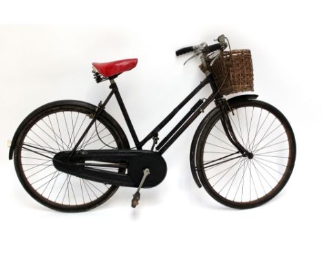 A vintage Humber-type bicycle and basket, 22" from bottom bracket to top of seat tube.