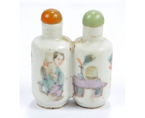 An early 20th century Chinese Famille Verte porcelain double cylindrical snuff bottle painted in enamels with a figure and ta