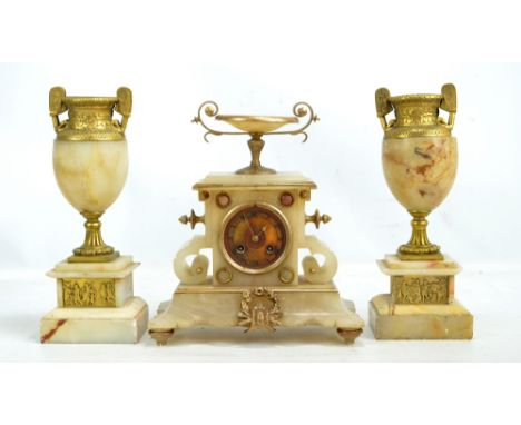 A Neo-classical style alabaster mantel clock and garniture, the circular dial set with Roman numerals, diameter 6.8cm, height