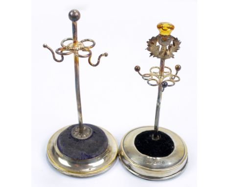 ADIE & LOVEKIN LTD; an Edward VII hallmarked silver hat pin stand surmounted with a citrine set thistle above three hooks and