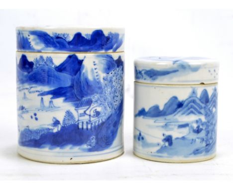 A Chinese porcelain cylindrical box and cover painted in underglaze blue with architectural and figural landscape to one side