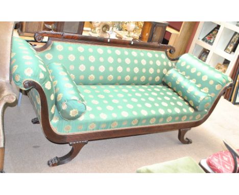 A modern Regency style mahogany framed scroll arm sofa on outswept legs to paw feet with modern upholstery, width approx 237c